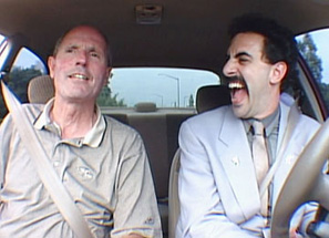 The driving instructor got an unpleasant surprise when Borat sneezed on him.