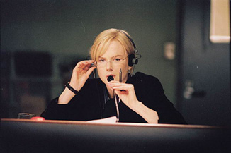 Nicole Kidman sits in a team's war room during the NFL draft.